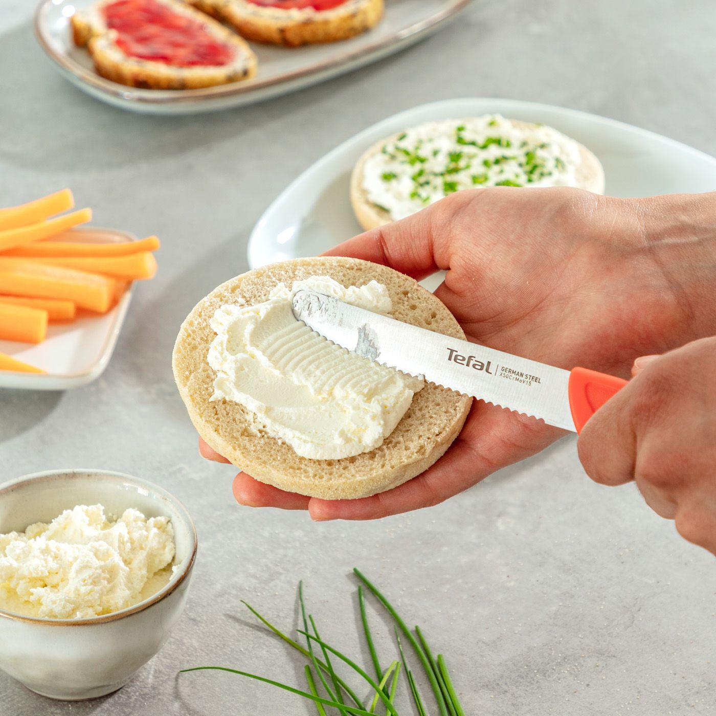 Tefal COLORFOOD universal knife serrated 10cm (orange)